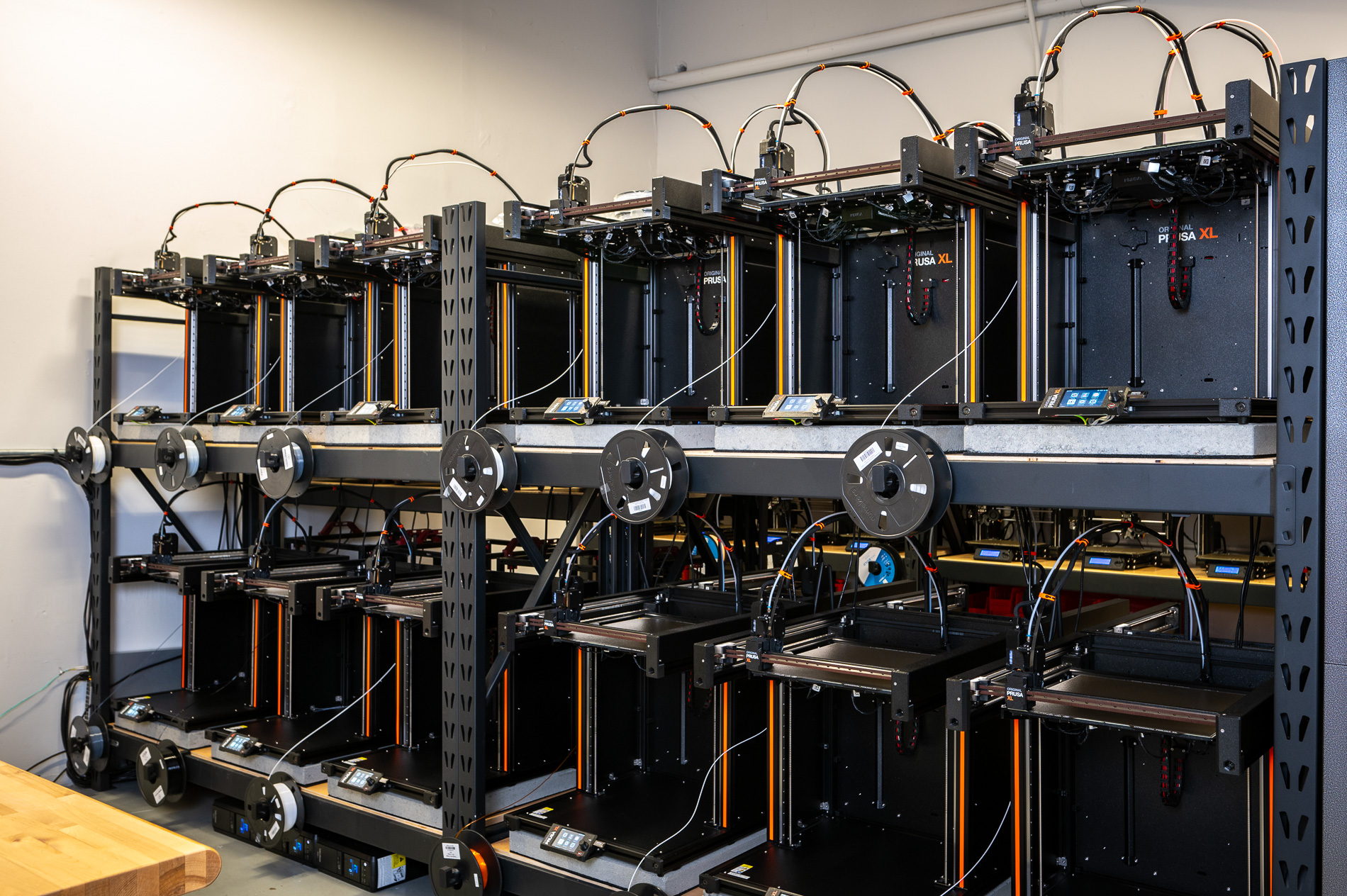 Prusa XL printers lined up for production work